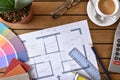 Table with plan tools and samples of a decorator top Royalty Free Stock Photo