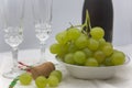 Glasses, cava and grapes to spend the new year with joy Royalty Free Stock Photo