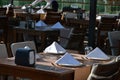 table prepared for a dinner with plates, fork, spoon and cutlery on wooden tables Royalty Free Stock Photo