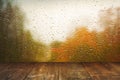 Table on rainy window background Royalty Free Stock Photo