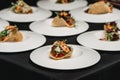 Table with ready to eat Spicy Shrimp Tacos with Coleslaw and Salsa Royalty Free Stock Photo