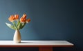 Table with red tulips in ceramic vase against blue wall. Interior background with copy space. Created with generative AI Royalty Free Stock Photo