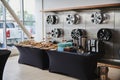 A table with refreshments at the presentation of new cars in the Toyota dealership. Royalty Free Stock Photo