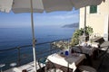 Table`s restaurant in the fishing village of Camogli, Gulf of Paradise, Portofino National Park, Genova, Liguria, Italy Royalty Free Stock Photo