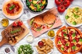 Table scene with a variety of delicious foods Royalty Free Stock Photo