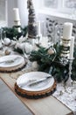 Table served for Christmas dinner in living room Royalty Free Stock Photo