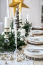 Table served for Christmas dinner in living room Royalty Free Stock Photo