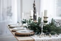 Table served for Christmas dinner in living room Royalty Free Stock Photo