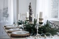 Table served for Christmas dinner in living room Royalty Free Stock Photo