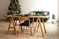 Table served for Christmas dinner in living room, close-up view, table setting, Christmas decoration Royalty Free Stock Photo