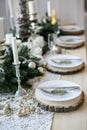 Table served for Christmas dinner in living room Royalty Free Stock Photo