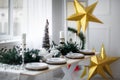 Table served for Christmas dinner in living room Royalty Free Stock Photo