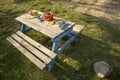 A table served with kid`s sand toys in a park.