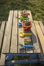 A table served with kid`s sand toys in a park