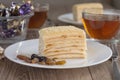 Table served with Napoleon cake and tea for two people. Royalty Free Stock Photo