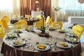 Table served for wedding banquet. Table setting. Number of guest. Royalty Free Stock Photo