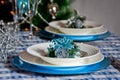 Table set for christmas dinner with decoration blue and silver Royalty Free Stock Photo