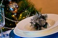 Table set for christmas dinner with decoration blue and silver Royalty Free Stock Photo