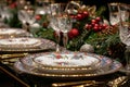 Table Set for Christmas Dinner With Plates and Silverware Royalty Free Stock Photo