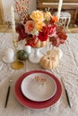 Table set with decor flowers and pumpkin on table Royalty Free Stock Photo