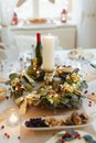 A table set for dinner meal at Christmas time. Royalty Free Stock Photo