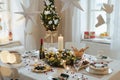 A table set for dinner meal at Christmas time. Royalty Free Stock Photo