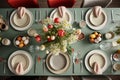 a table set for a dinner party with plates , utensils , and flowers on it Royalty Free Stock Photo