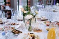 Table set for an event party or wedding reception. There is a lot of varied food on the table, luxury catering. Royalty Free Stock Photo