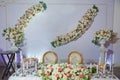 Table set for event party or white flowers wedding reception . Wedding banquet in restaurant, tables with flowers and Royalty Free Stock Photo
