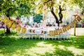 A table set for kids birthday party outdoors in garden in summer. Royalty Free Stock Photo