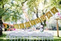 A table set for kids birthday party outdoors in garden in summer. Royalty Free Stock Photo