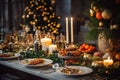 A table set with plates of food and candles. Perfect for creating an inviting and cozy atmosphere for a special occasion Royalty Free Stock Photo