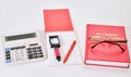 Table set purchasing Manager: glasses, calculator, Notepad, pen, magnifying glass, and a directory of suppliers