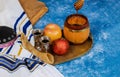 Table set with traditional food for Jewish New Year Holiday, Rosh Hashana
