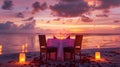 A table set for two on the beach with candles lit, AI Royalty Free Stock Photo