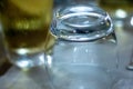 Table set up in a restaurant. narrow frame with objects that are usually found in a restaurant such as beverage glasses etc.