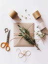 Table is set with variety of items, including scissors and tape. There are also two envelopes on table, one of which Royalty Free Stock Photo