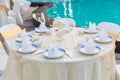 Table set for wedding or another catered event dinner, luxury wedding table setting for fine dining at outdoors. Royalty Free Stock Photo