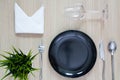 Table setting from above elegant empty plate cutlery napkin and