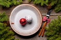 Table setting from above with empty plate, Christmas Fir tree