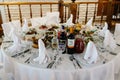 Table setting for a banquet or holiday. Empty glasses for spirits, champagne and juice. Cold appetizers and salads