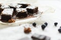 Table setting, chocolate dessert brownie cake with berries on pa Royalty Free Stock Photo