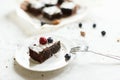 Table setting, chocolate dessert brownie cake with berries Royalty Free Stock Photo