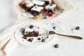 Table setting, chocolate dessert brownie cake with berries on a Royalty Free Stock Photo