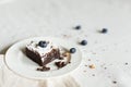 Table setting, chocolate dessert brownie cake with berries on a Royalty Free Stock Photo