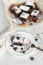 Table setting, chocolate dessert brownie cake with berries on a Royalty Free Stock Photo