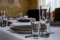 Table setting. Cutlery. Glass, stack, bowls and fork on the table