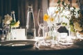 Table setting for dinner or banquet in restaurant on the sunset Royalty Free Stock Photo