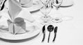 Table setting  Dinner plate in restaurant, black and white photo Royalty Free Stock Photo