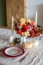Serving plate with pumpkin and flowers as decor Royalty Free Stock Photo